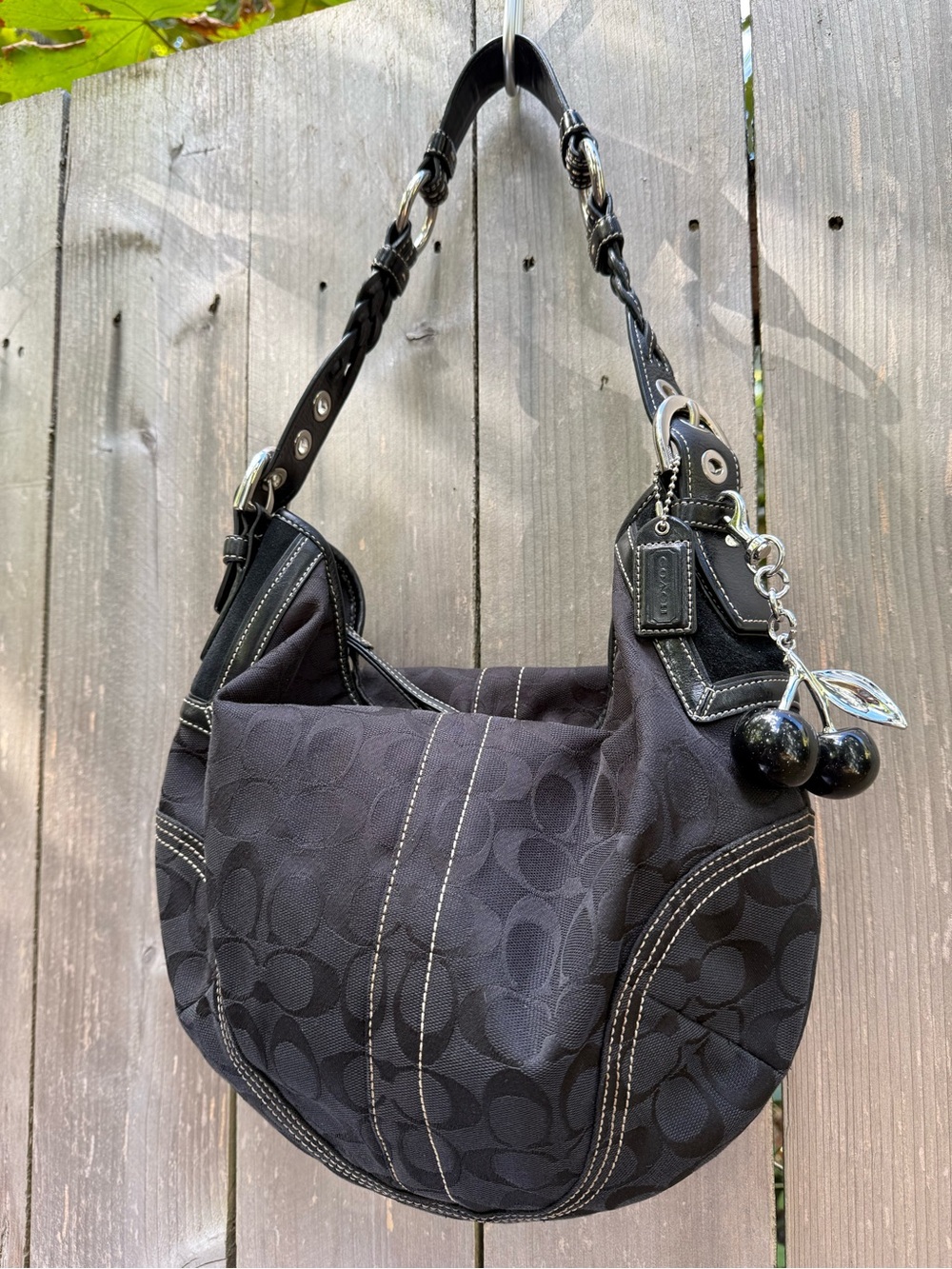 Coach Black Signature Hobo Bag with Cherry Charm